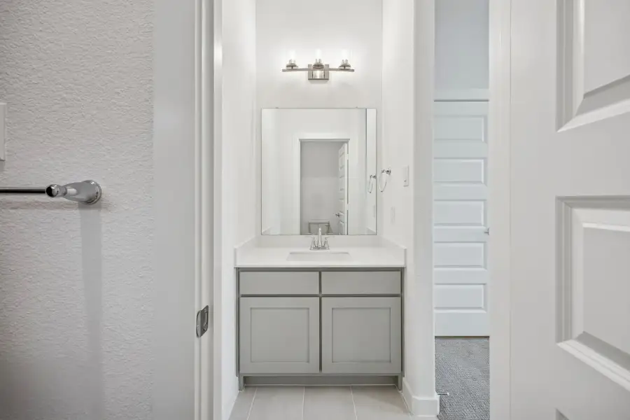 Bathroom in the Gilmour II home plan by Trophy Signature Homes – REPRESENTATIVE PHOTO