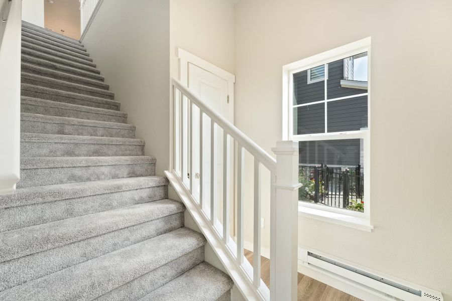 Spacious, unfurnished interior of a new home in The Lakes at Centerra - Discovery, Loveland (Image 26).