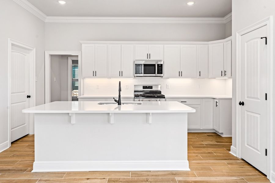 Furnished interior view inside a new home in The Bluffs at Lafayette, Freeport (Image 5).
