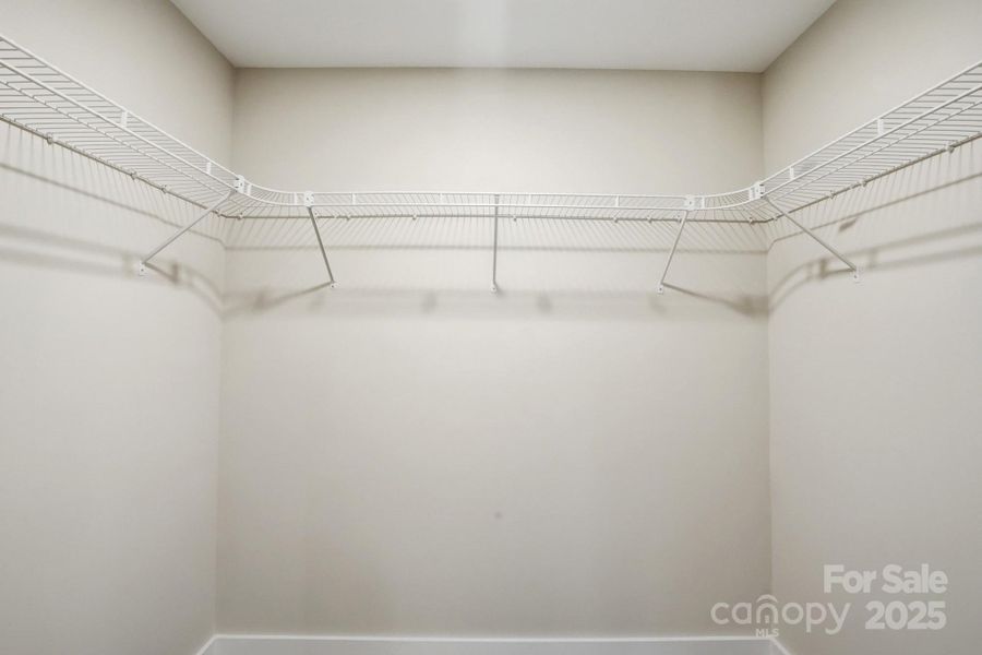 Primary Bedroom's walk-in closet