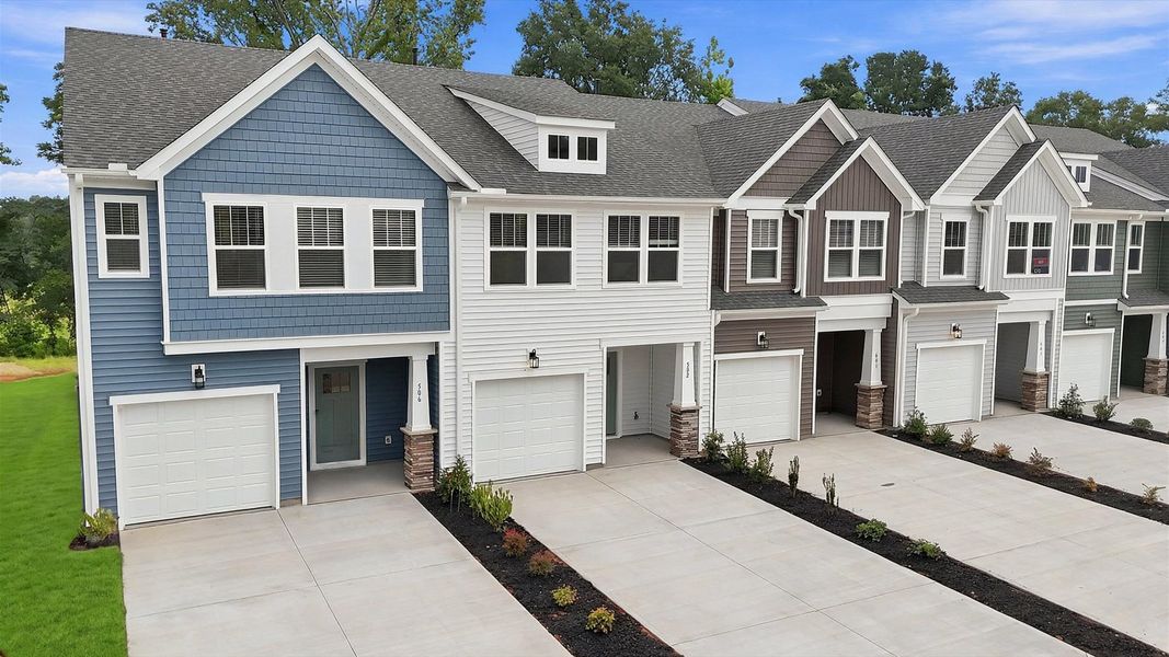 Eye-catching exterior with timeless color palette and superior architectural detail by DRB Homes Eye-catching exterior with timeless color palette and superior architectural detail by DRB Homes