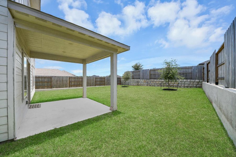 Exterior details and patio area of a home in Montgomery Oaks - Premier, Conroe (Image 3). Exterior details and patio area of a home in Montgomery Oaks - Premier, Conroe (Image 3).