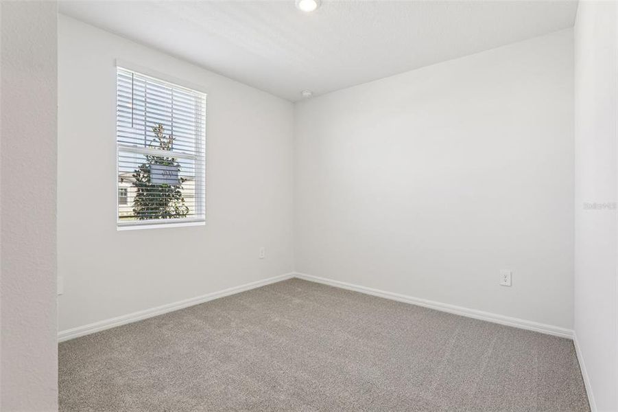 Spacious, unfurnished interior of a new home in Lake Deer Estates - Signature Series, Poinciana (Image 19).