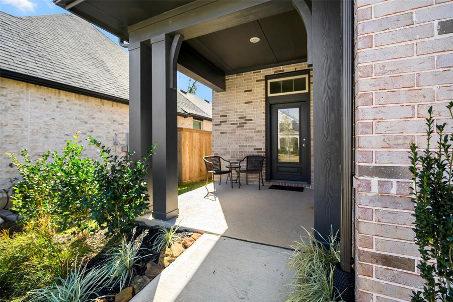 Exterior details and patio area of a home in The Highlands 40', Porter (Image 3).