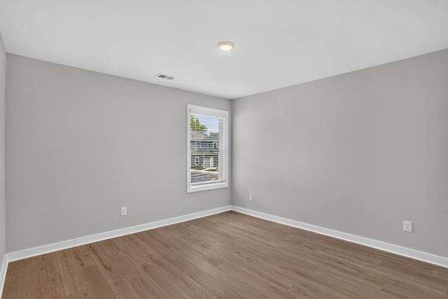 Spacious, unfurnished interior of a new home in The Cottages at East Lanier, Fayetteville (Image 9).