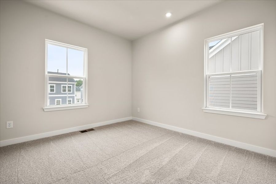 Spacious, unfurnished interior of a new home in Townes at The Station, Apex (Image 21).