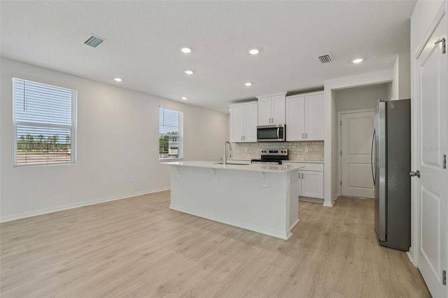 Furnished interior view inside a new home in Bradford Park, Ormond Beach (Image 7).