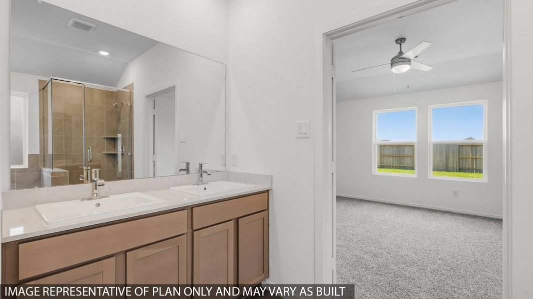 Furnished interior view inside a new home in Sunterra, Katy (Image 8).