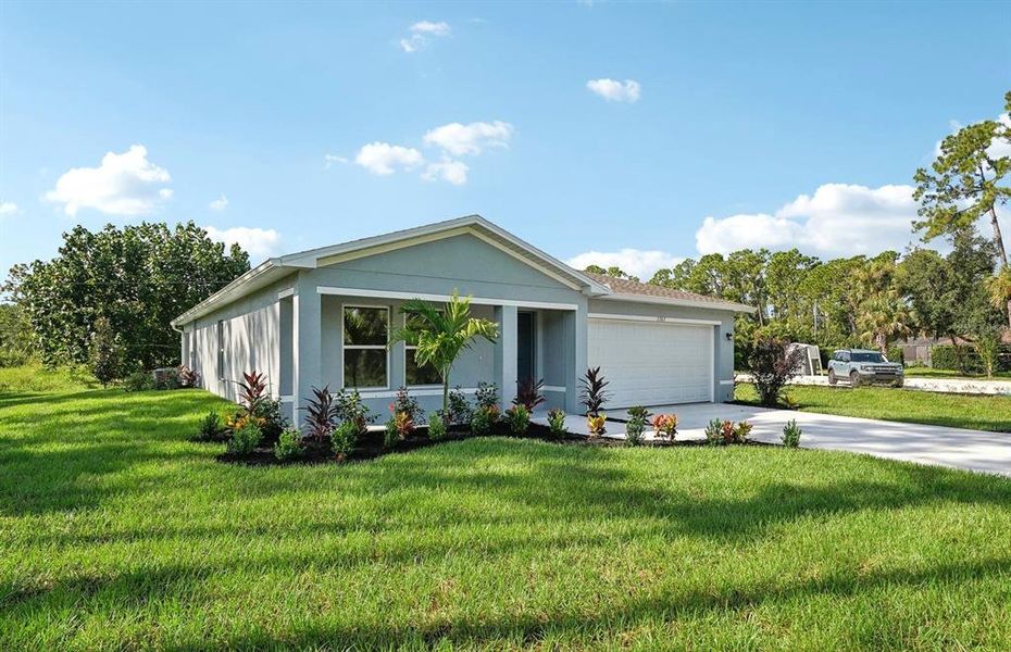 Front exterior of a new home in North Port Classic, North Port, FL, highlighting curb appeal (Image 28).