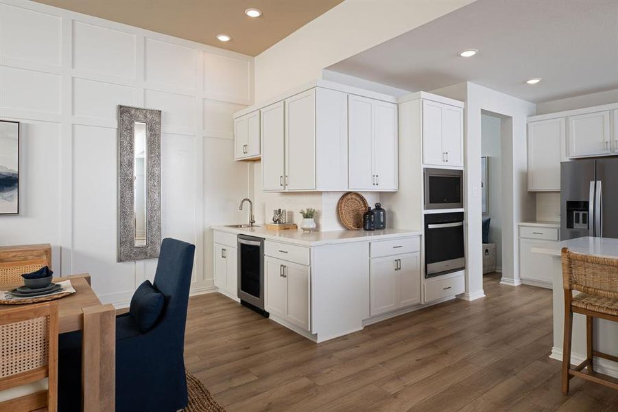 Furnished interior view inside a new home in Villages of Hurricane Creek, Anna (Image 9).
