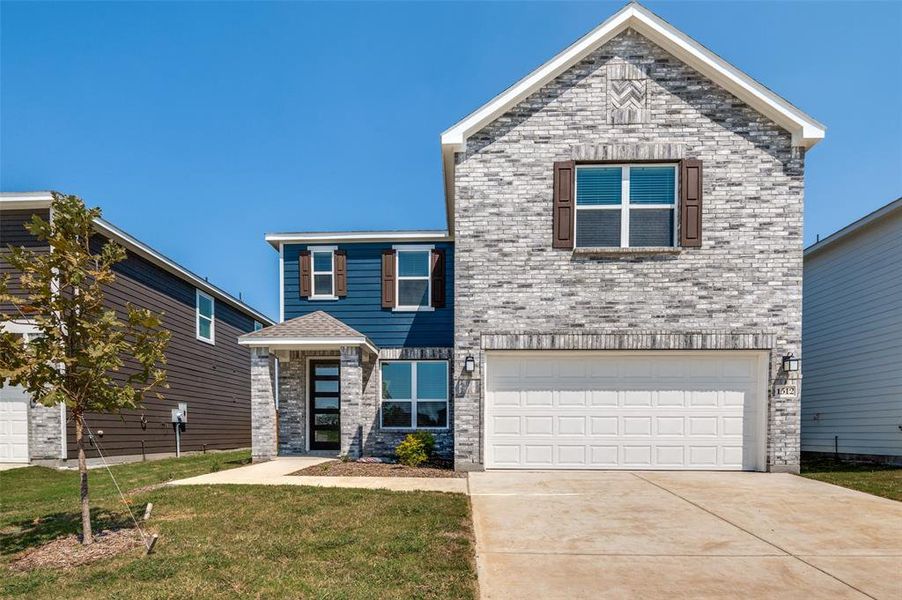 Front exterior of a new home in Cottonwood Creek, Seagoville, TX, highlighting curb appeal (Image 16).