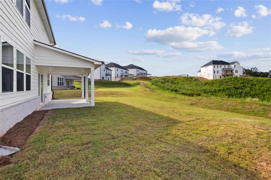 Exterior details and patio area of a home in The Estates at Gainesville Township, Gainesville (Image 10).