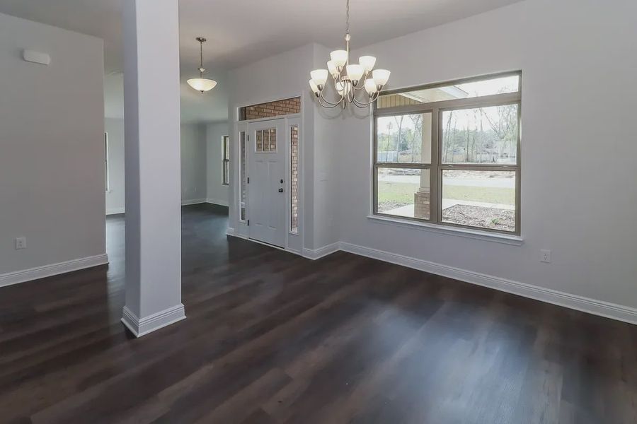 Representative unfurnished interior of a home built from the Plan 2502 by Adams Homes in Cedar Creek at Deerpoint Lake, Panama City (Image 19).