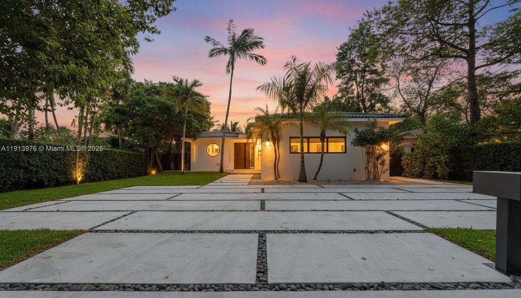 Front exterior of a new home in , Miami Beach, FL, highlighting curb appeal (Image 2). Front exterior of a new home in , Miami Beach, FL, highlighting curb appeal (Image 2).
