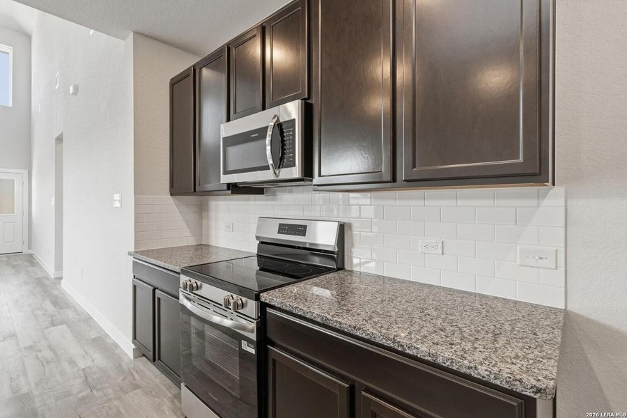 Furnished interior view inside a new home in Red Hawk Landing, San Antonio (Image 7).