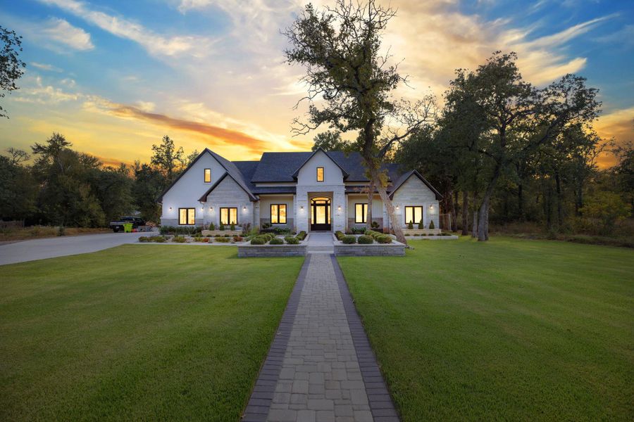 Modern farmhouse featuring a yard Modern farmhouse featuring a yard