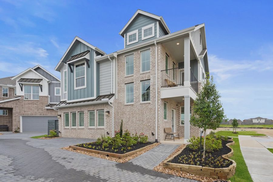 Representative exterior photo of a completed home built from the Riverdale by Chesmar Homes in Bridgeland, Elgin, TX (Image 24).