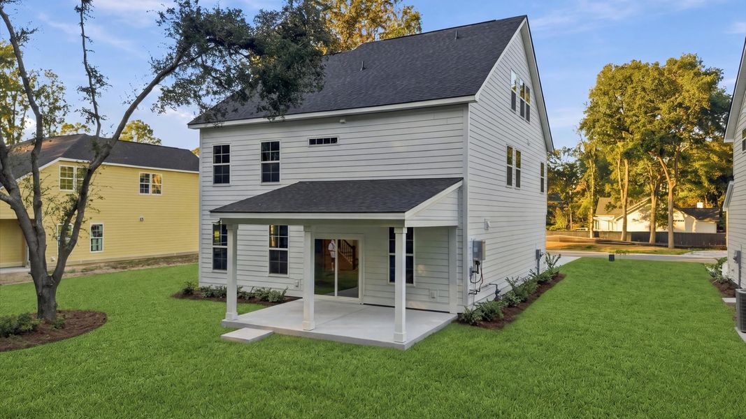 Exterior details and patio area of a home in Oak Bend, James Island (Image 4).