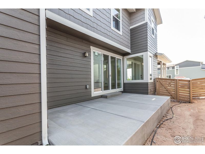 Exterior details and patio area of a home in Trailside Story Collection - Single Family Homes, Timnath (Image 4).