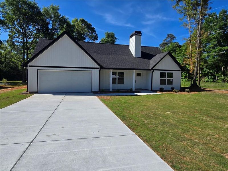 Front exterior of a new home in , Lavonia, GA, highlighting curb appeal (Image 13).