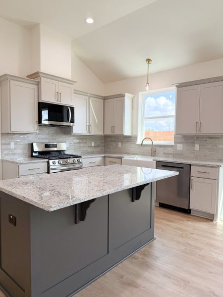 Furnished interior view inside a new home in TerraVista, Victoria (Image 11).