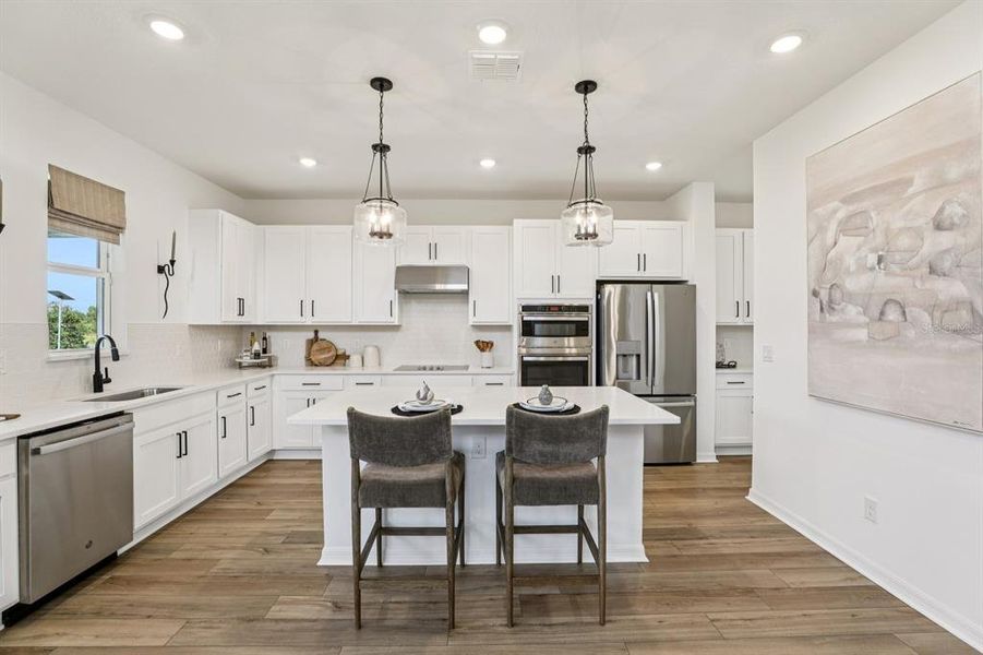 Furnished interior view inside a new home in Hawks Run, Kissimmee (Image 55).