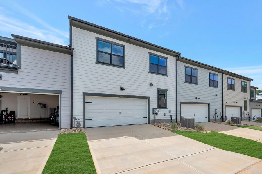 Front exterior of a new home in Seven Oaks, Belmont, NC, highlighting curb appeal (Image 15).