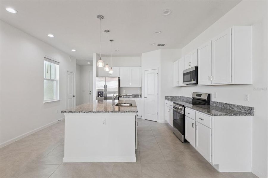 Furnished interior view inside a new home in Grand Isle, Grand Island (Image 6).