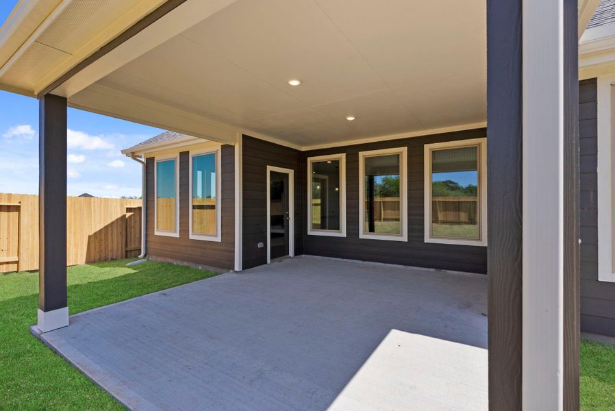 Exterior details and patio area of a home in Trinity Grove, Spring (Image 3). Exterior details and patio area of a home in Trinity Grove, Spring (Image 3).