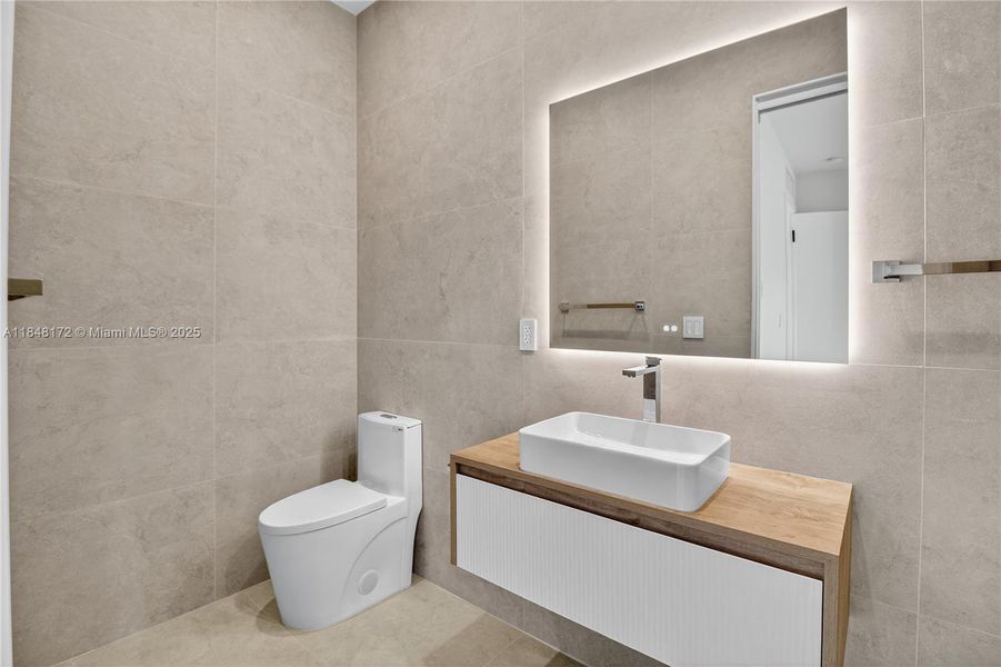 Furnished interior view inside a new home in , Coral Gables (Image 29).