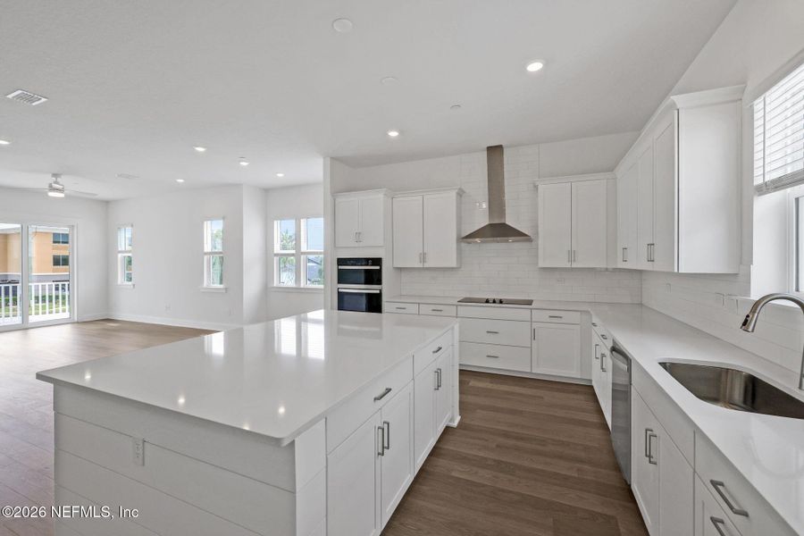 Furnished interior view inside a new home in North Beach Townhomes, Jacksonville Beach (Image 14).