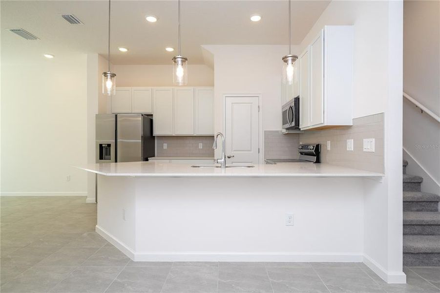 Furnished interior view inside a new home in Paradiso Grande, Orlando (Image 11).