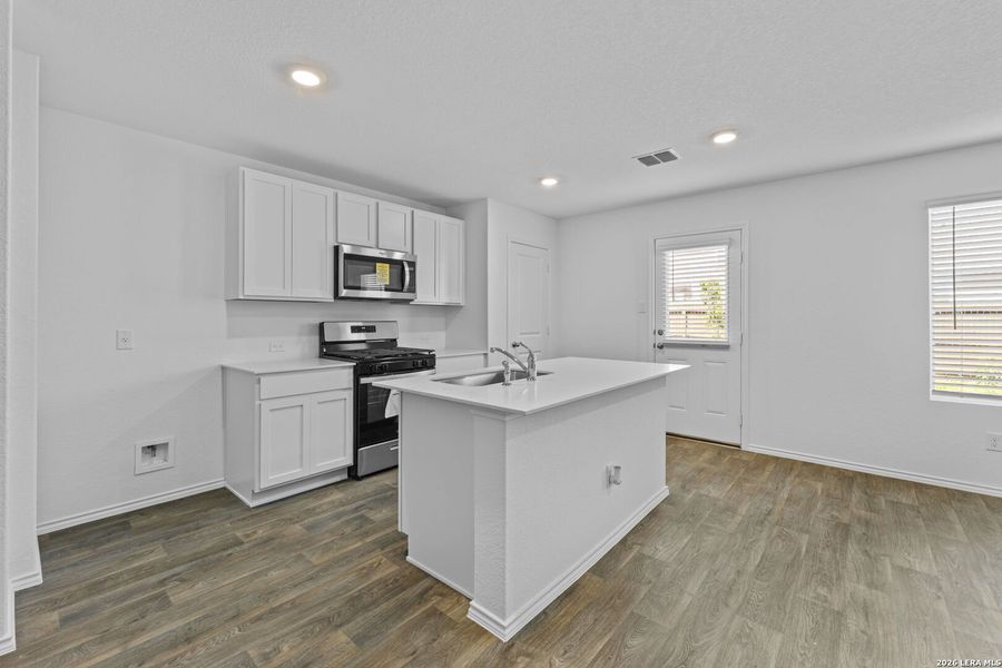 Furnished interior view inside a new home in Avenida, Converse (Image 6).