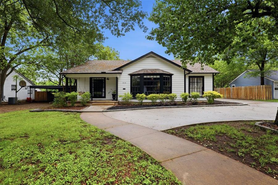 Front exterior of a new home in , Cleburne, TX, highlighting curb appeal (Image 23). Front exterior of a new home in , Cleburne, TX, highlighting curb appeal (Image 23).