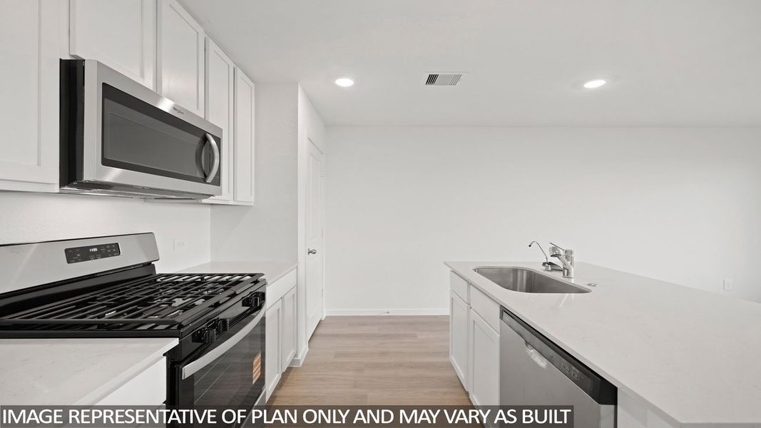 Furnished interior view inside a new home in Sunterra Lakes, Brookshire (Image 8).