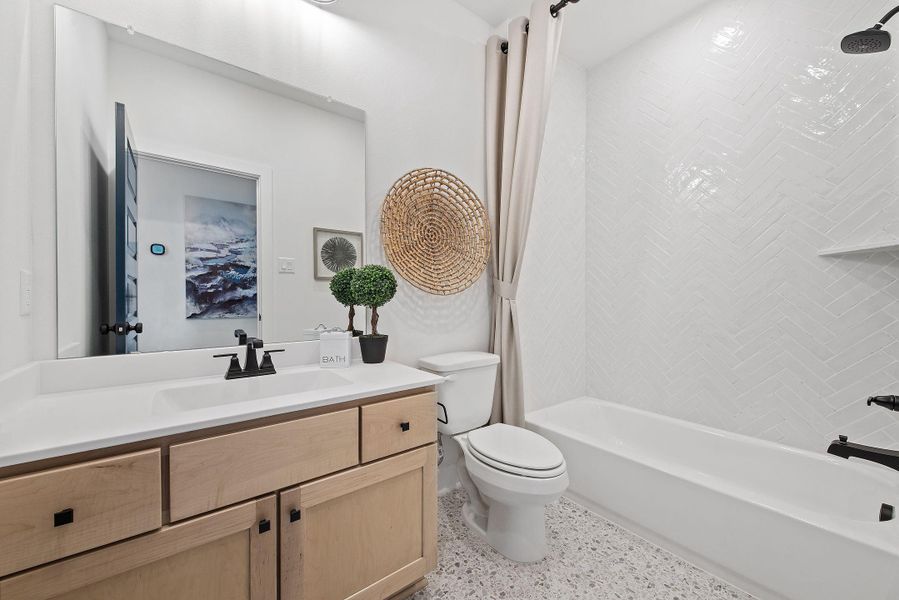 Furnished interior view inside a new home in Bridgeland, Cypress (Image 34). Furnished interior view inside a new home in Bridgeland, Cypress (Image 34).