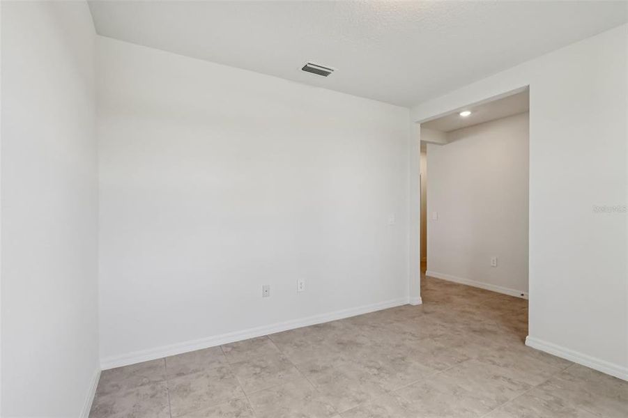 Spacious, unfurnished interior of a new home in Bradbury Creek - Signature Series, Haines City (Image 22).