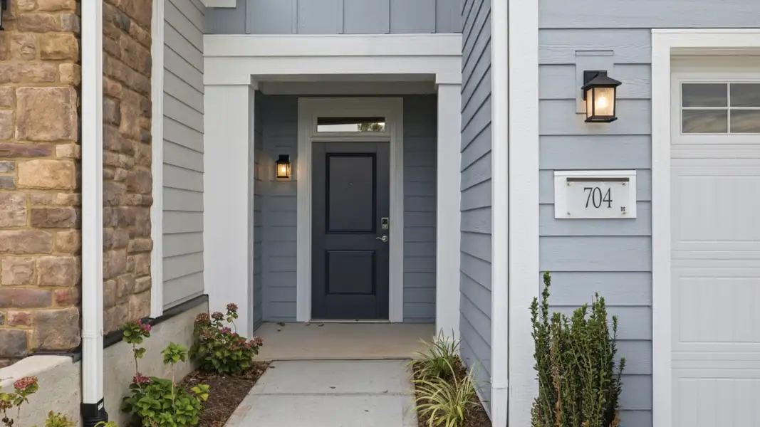 Exterior details and patio area of a home in The Courtyards at Oak Grove, Durham (Image 3).