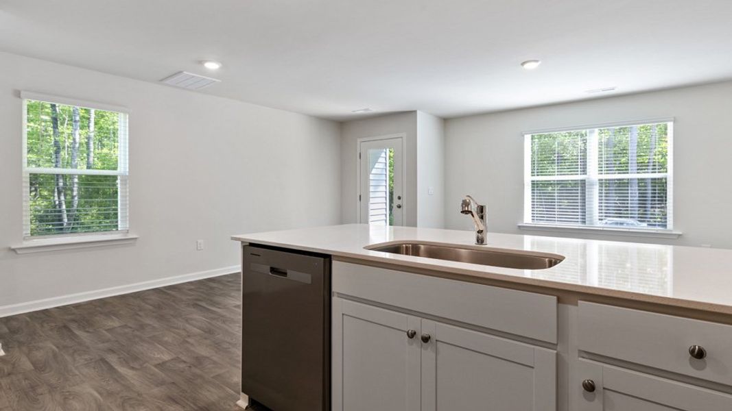 Furnished interior view inside a new home in Edinborough Townes, Gibsonville (Image 5).