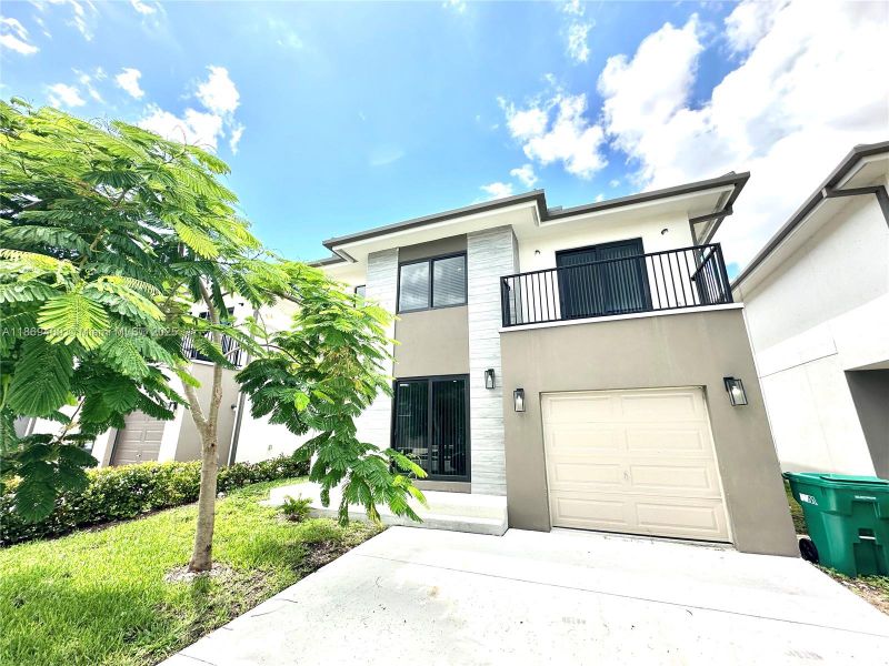 Front exterior of a new home in , Florida City, FL, highlighting curb appeal (Image 14).