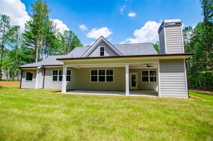 Front exterior of a new home in , Douglasville, GA, highlighting curb appeal (Image 25).