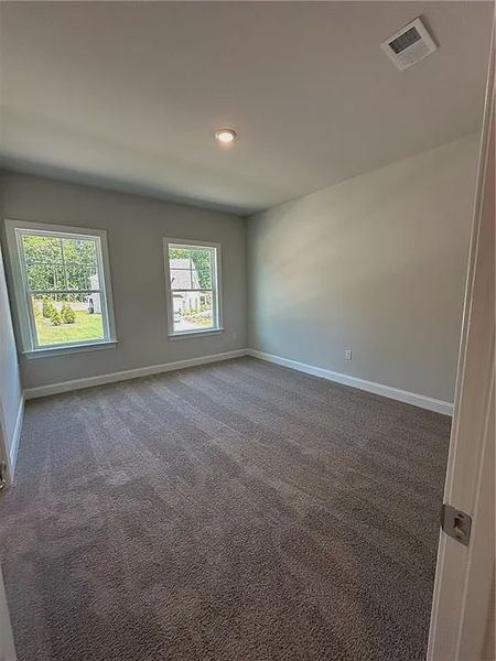 Spacious, unfurnished interior of a new home in Mirror Lake at South Harbour, Villa Rica (Image 29).
