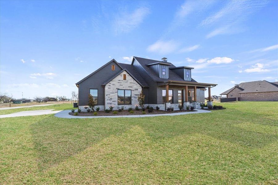 Front exterior of a new home in , Caddo Mills, TX, highlighting curb appeal (Image 5).