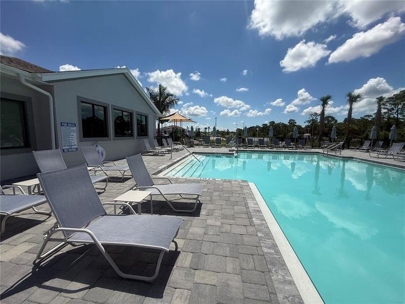 Exterior details and patio area of a home in Island Lakes at Coco Bay: Executive Homes, Englewood (Image 3). Exterior details and patio area of a home in Island Lakes at Coco Bay: Executive Homes, Englewood (Image 3).