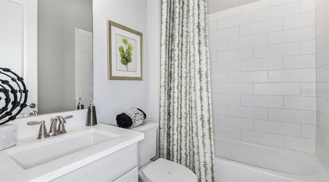 Furnished interior view inside a new home in Esplanade at Skye Ranch, Sarasota (Image 9).