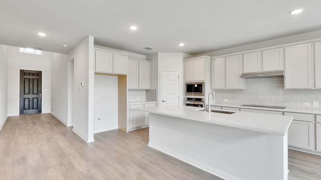 Furnished interior view inside a new home in Oaks at San Gabriel, Georgetown (Image 5).