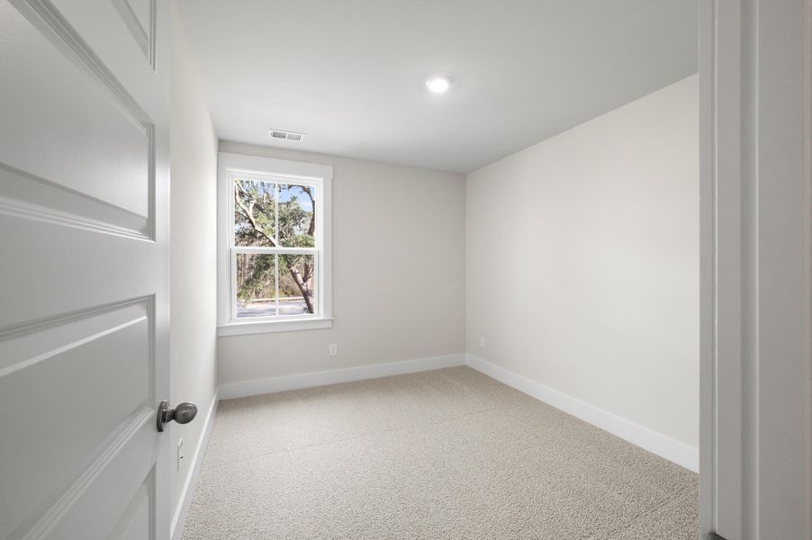 Photo is of a similar home