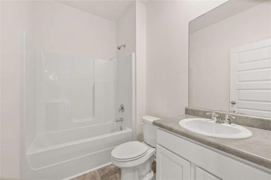 Furnished interior view inside a new home in The Preserve at Agricultural Village, Perry (Image 15).