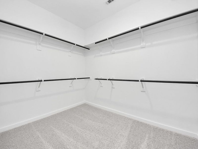 Spacious, unfurnished interior of a new home in Sunterra, Katy (Image 22).
