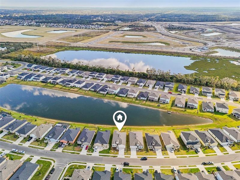 Front exterior of a new home in , Parrish, FL, highlighting curb appeal (Image 26).